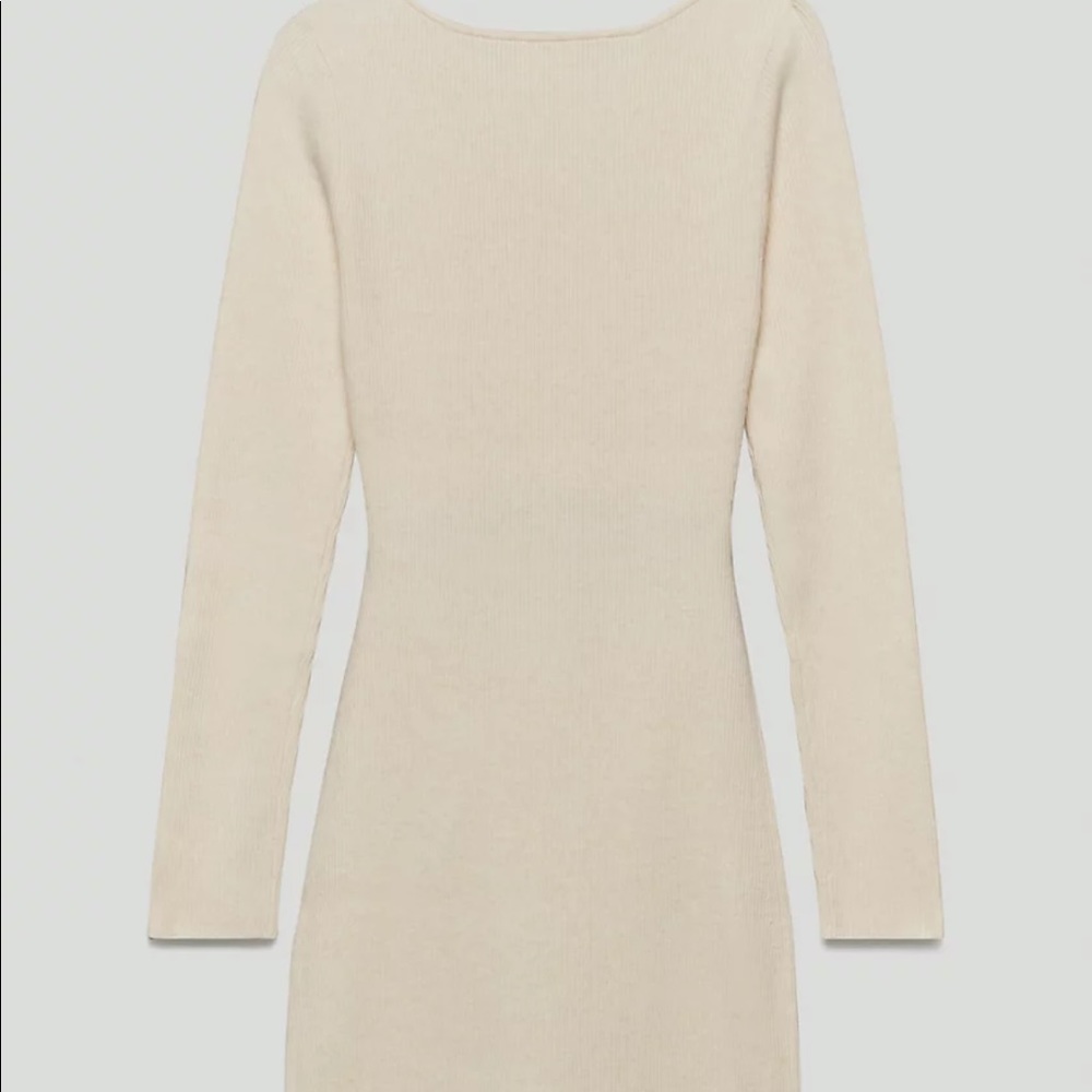 ARITZIA sweater dress with long sleeves and a cut-out detail at the waist.